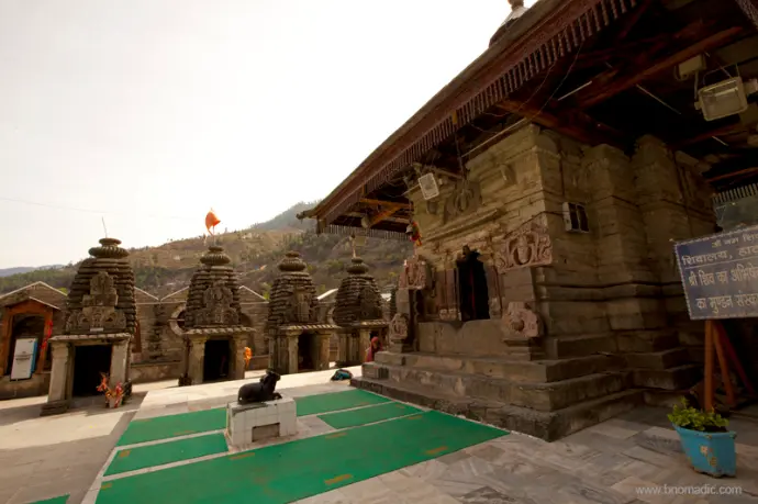 Hatkoti Temple complex set against lush Pabbar Valley mountains - Mountain Junkey
